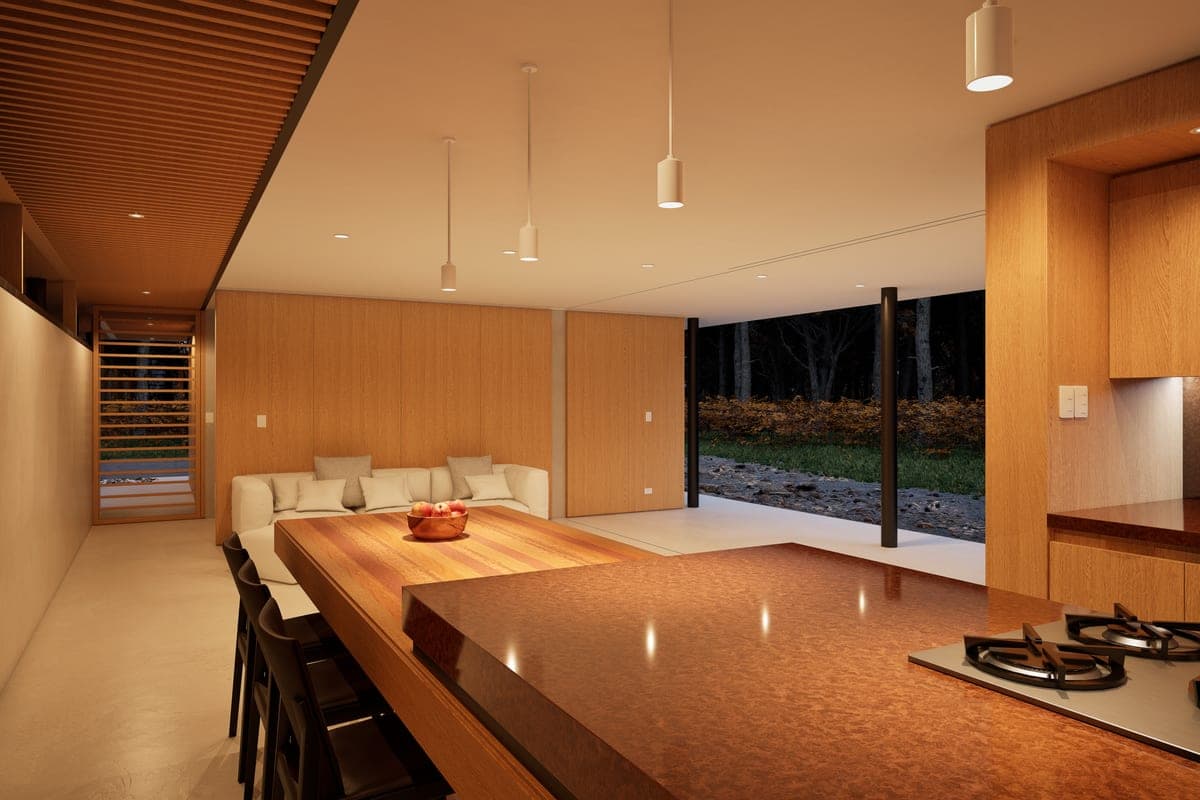 Warm automated lighting in a modern open-plan home at dusk